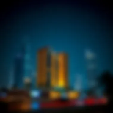 Illuminated Al Waleed Building at Night Night view of the Al Waleed Building illuminated against the skyline