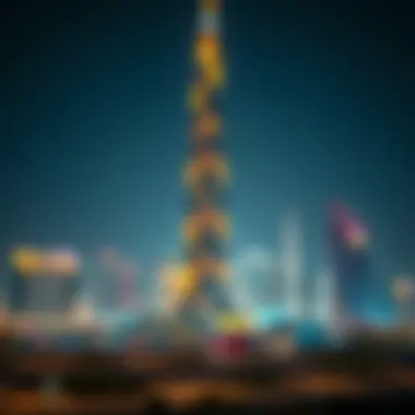 Night view of Al Wasl Tower illuminated against the skyline